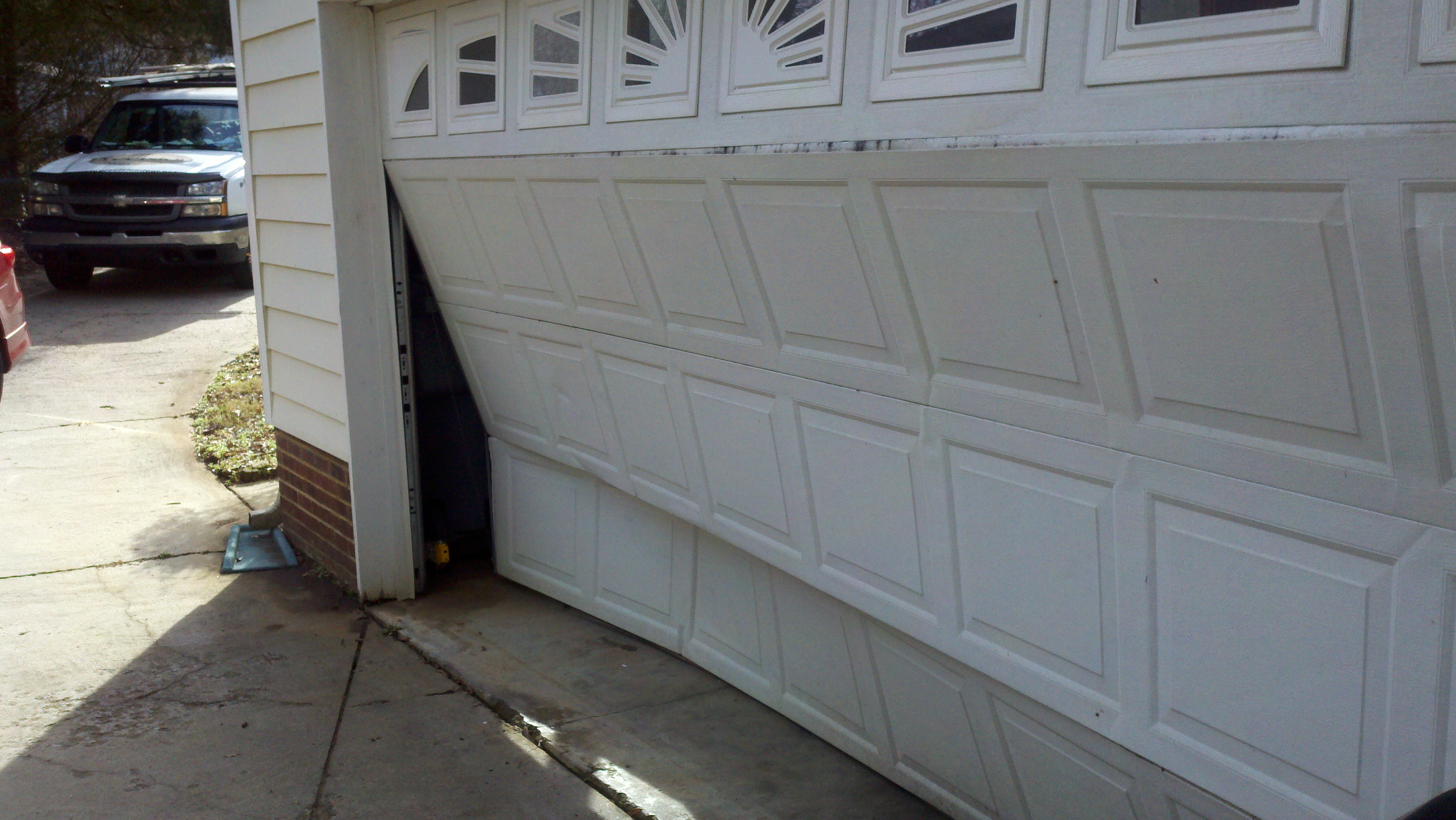 Wayne-Dalton Overhead Garage Doors Repair in Charlotte - DamageD Garage Door Sections